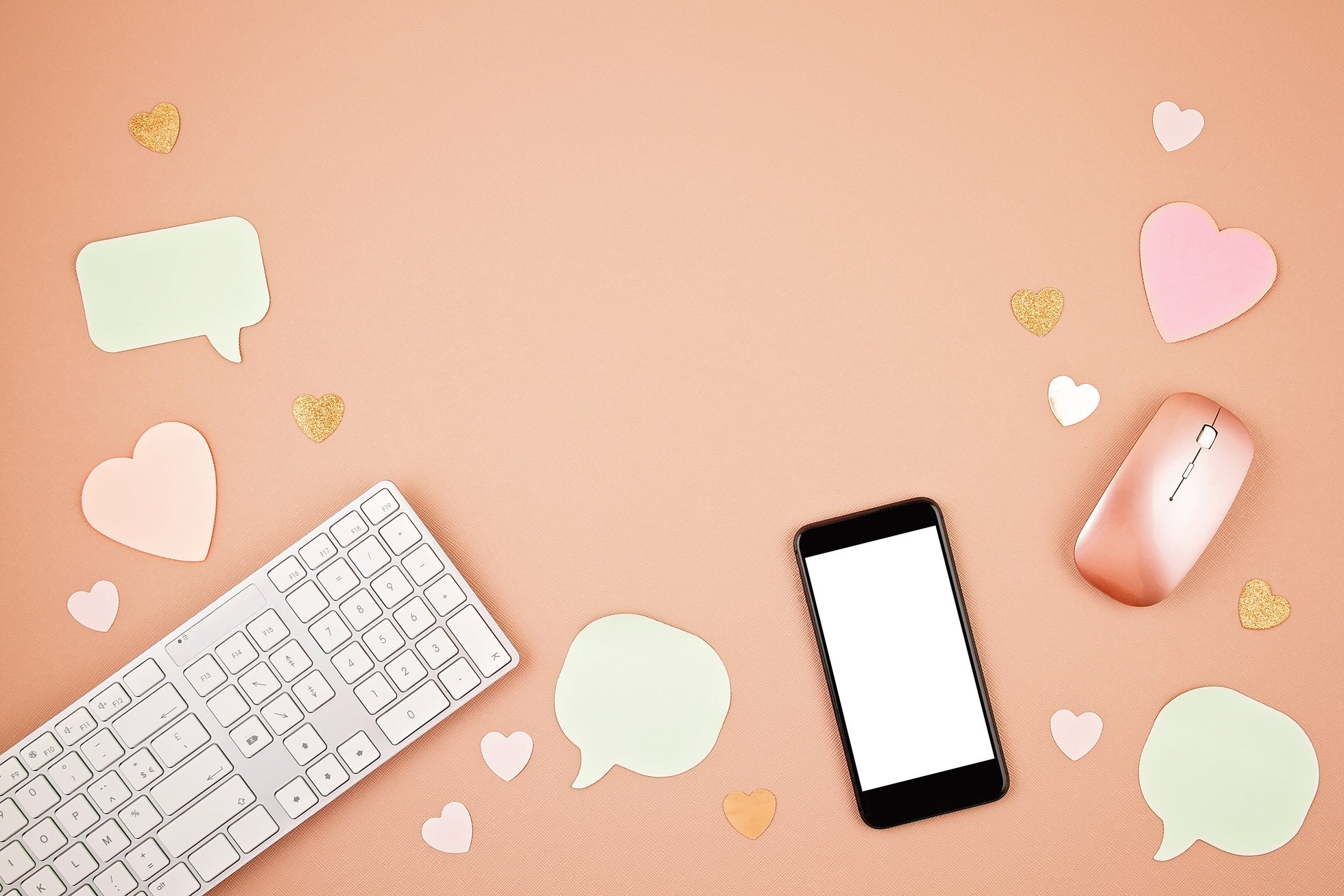 Social media concept flatlay with keyboard, phone, mouse